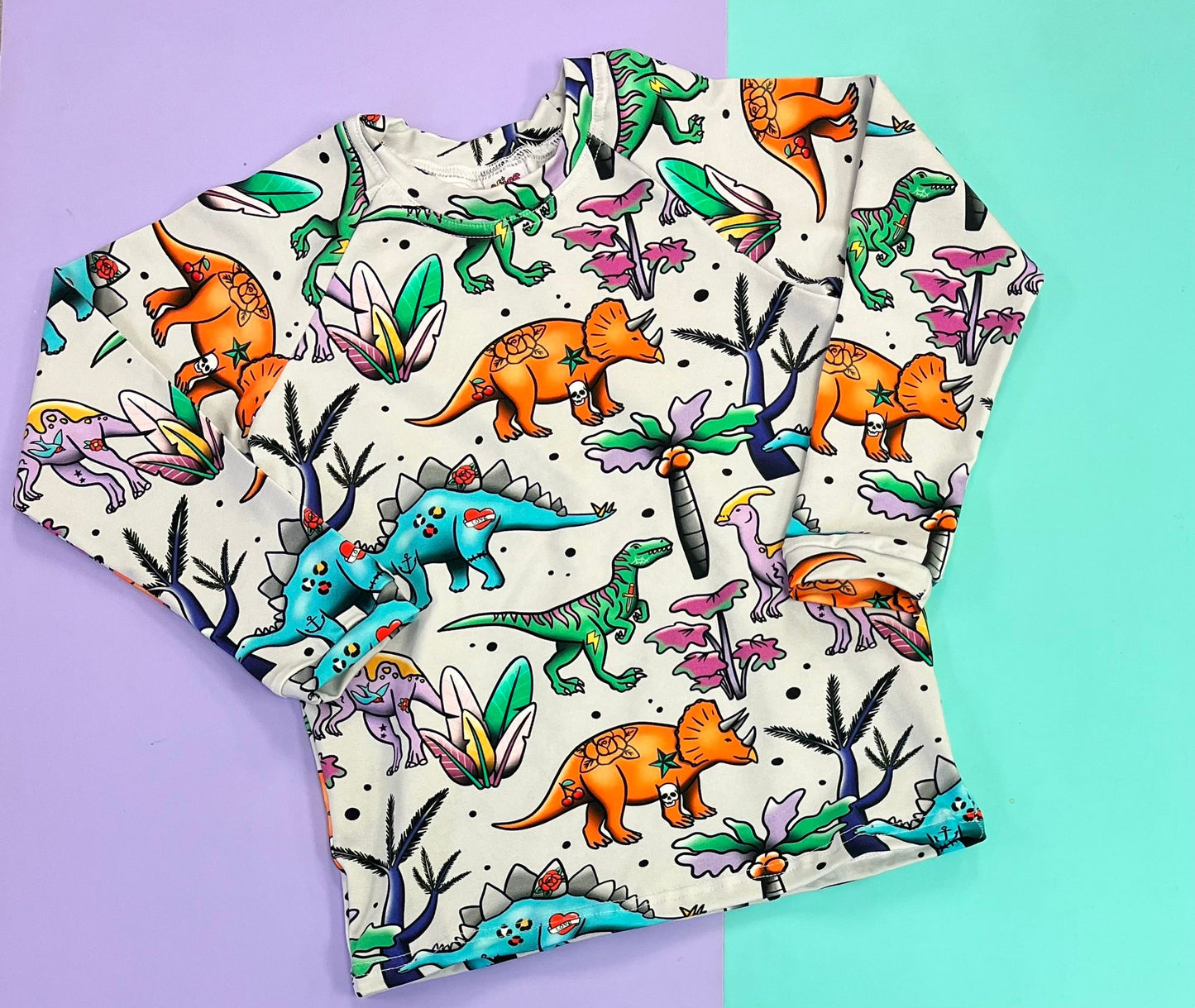 Tattoo Dino T-Shirts, Peplums and Vests (All Styles)